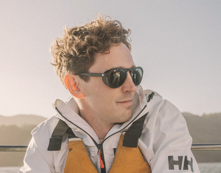 guy turning head to the side wearing sunski treeline sunglasses