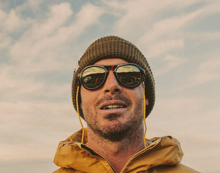 man looking at camera wearing sunski treeline sunglasses