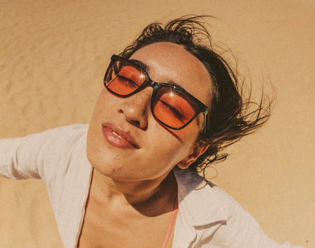 woman basking in sunski ventana polarized sunglasses