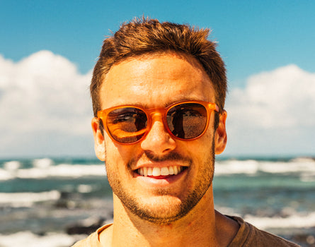 guy smiling wearing sunski yuba sunglasses