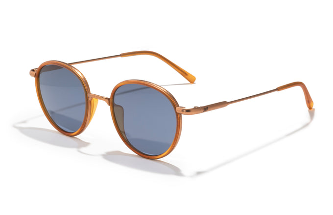 sunski baia tangerine midnight three quarter angle