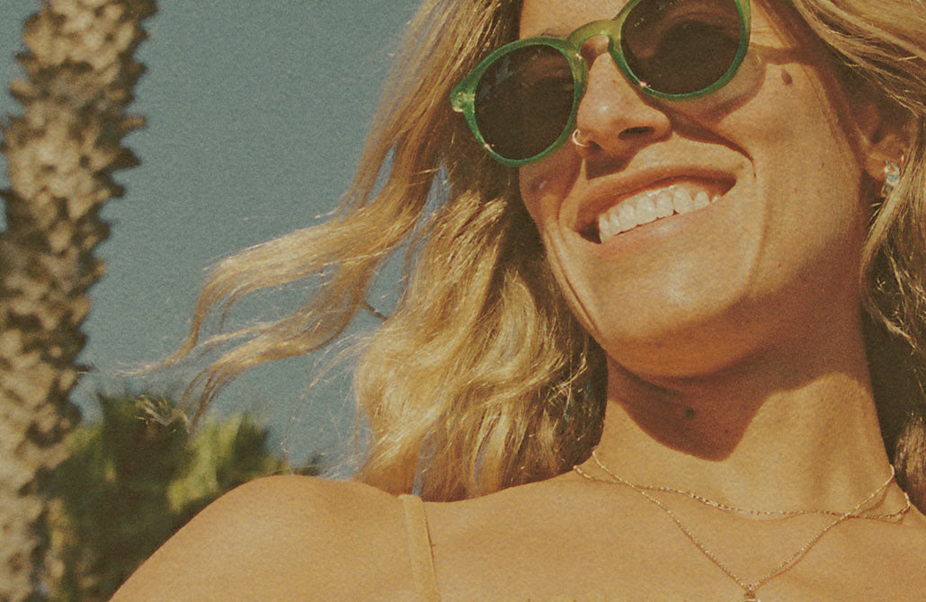 woman in limited edition sunski sunglasses