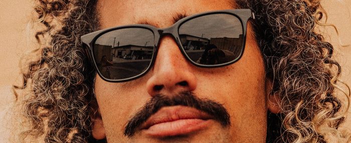 close up of guy wearing sunski ventana sunglasses