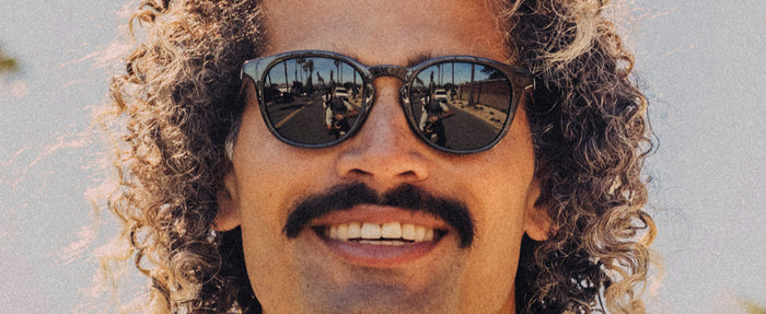 close up of guy wearing sunski yuba sunglasses