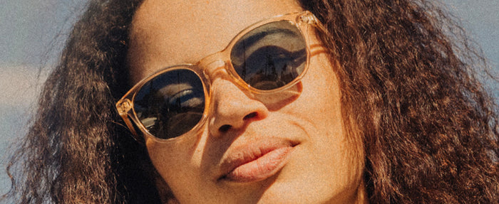 close up of woman wearing sunski yuba sunglasses