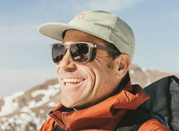 guy smiling wearing sunski couloir sunglasses