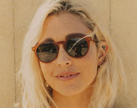 woman wearing sunski dipsea rust forest sunglasses