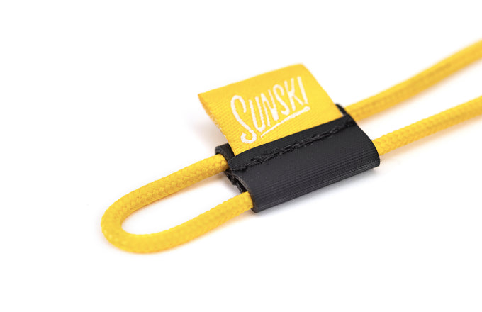 sunski sunglasses retainer yellow close up of 8-loop attachment