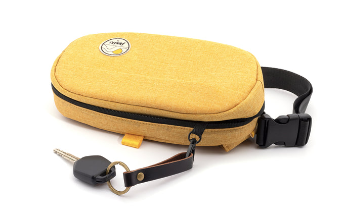 sunski carry sling yellow laydown showing key attachement