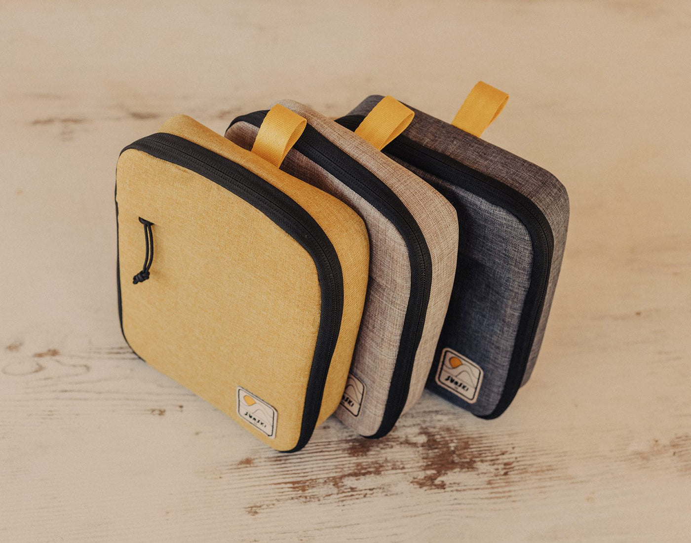 lineup of three travel case colors