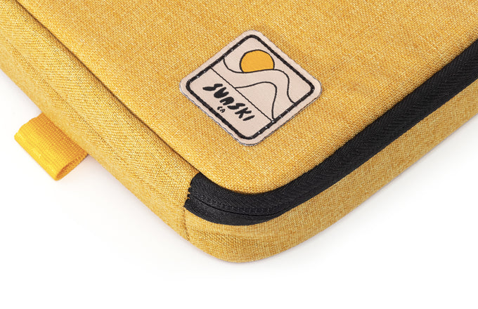 sunski travel case yellow close up of patch