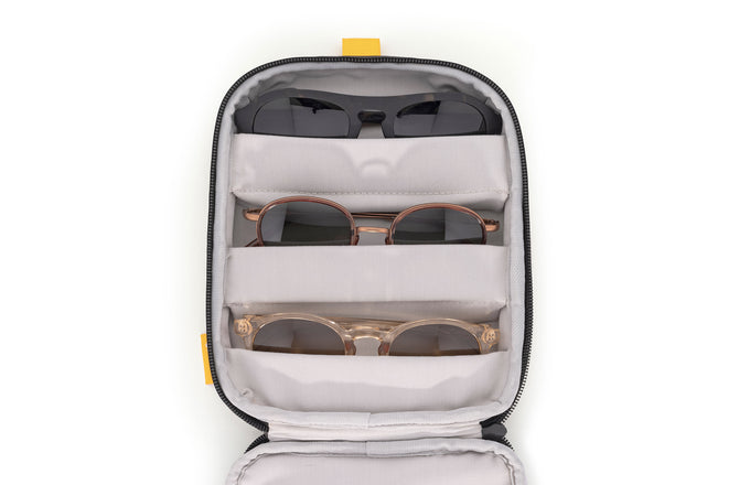 sunski travel case yellow showing sunglasses in padded pockets