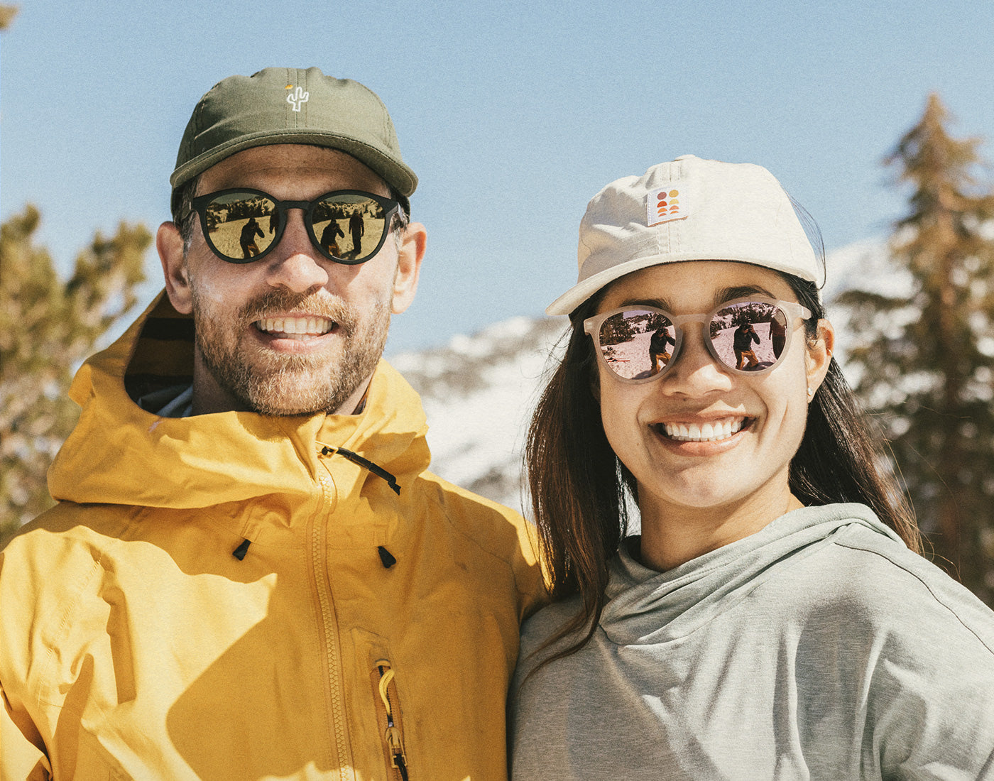 man and woman wearing sunski friendly cactus hat