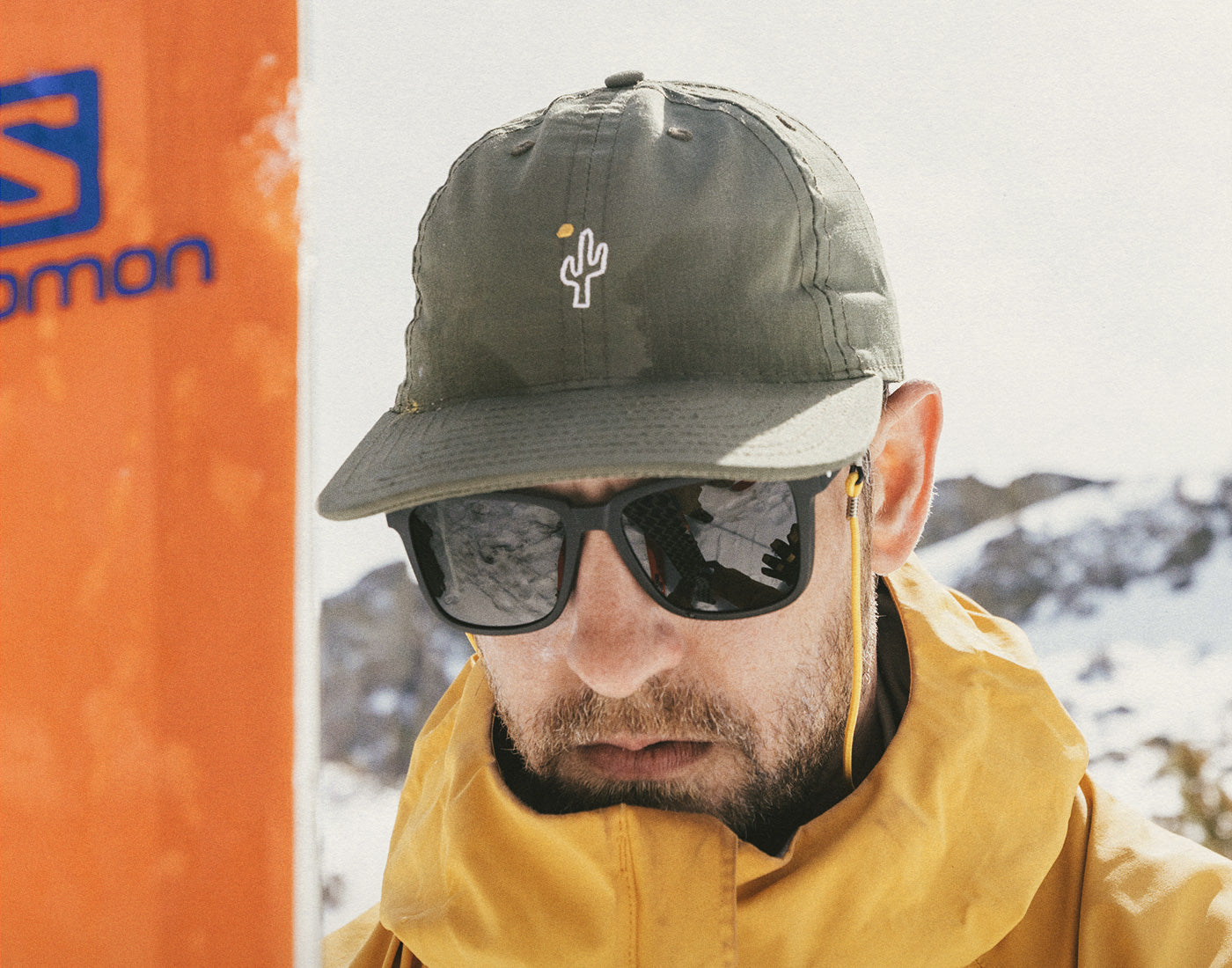 man wearing sunski friendly cactus hat
