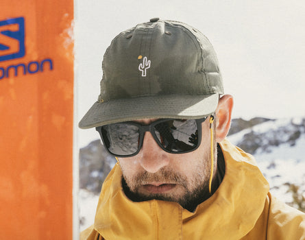 man wearing sunski friendly cactus hat