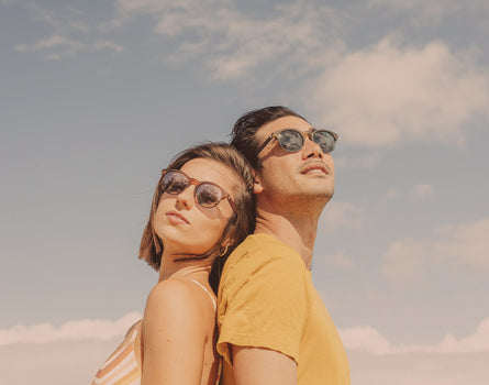 guy and girl wearing sunski avila sunglasses
