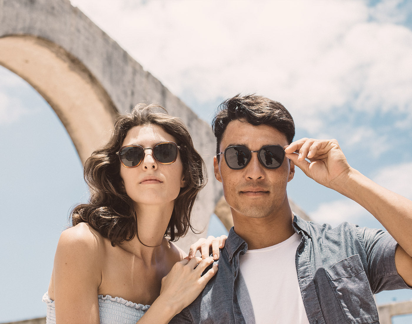 guy and girl wearing sunski bernina sunglasses