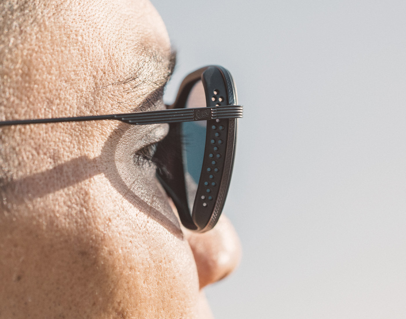 close up of side shields of sunski bernina sunglasses