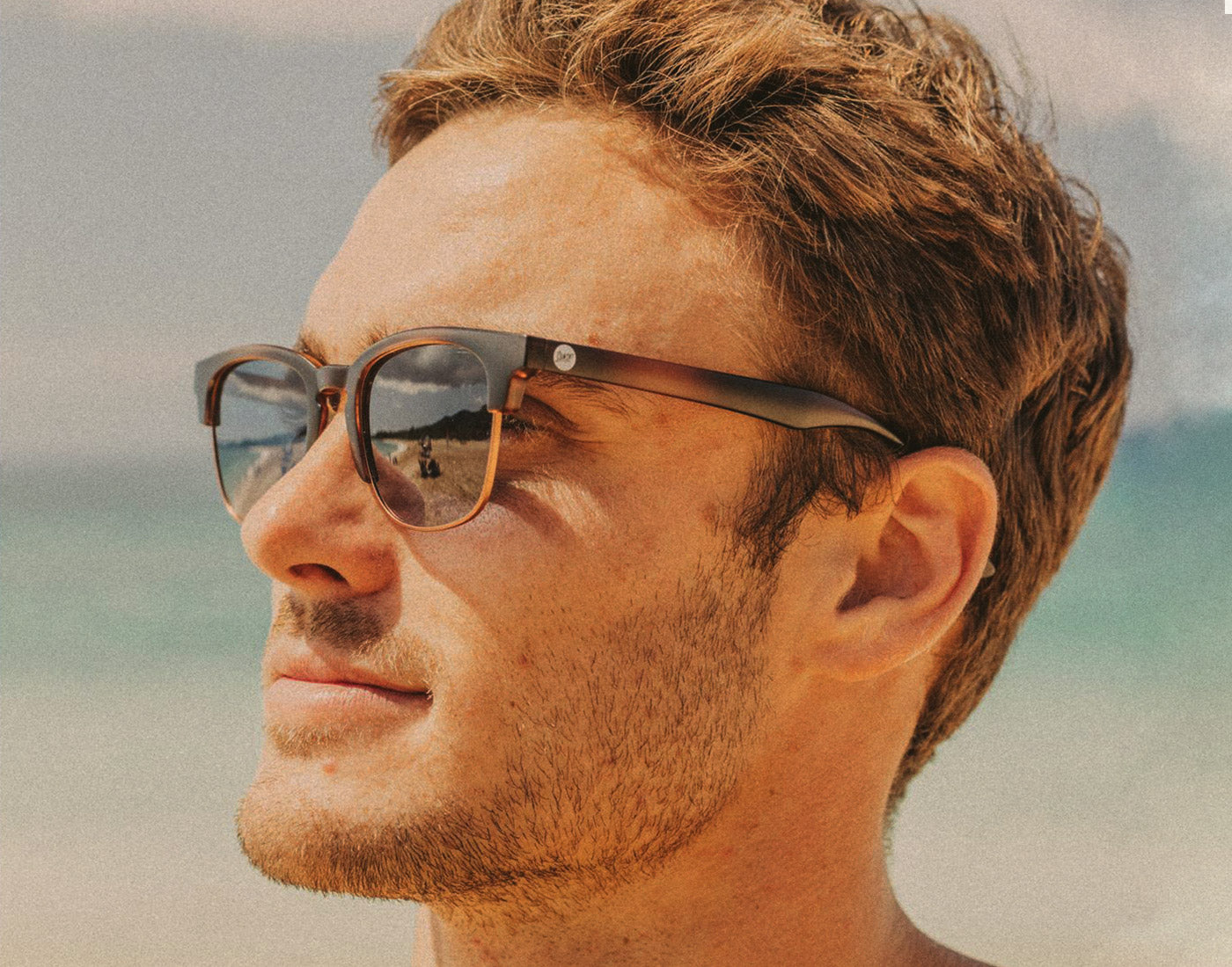 profile of man wearing sunski cambria sunglasses