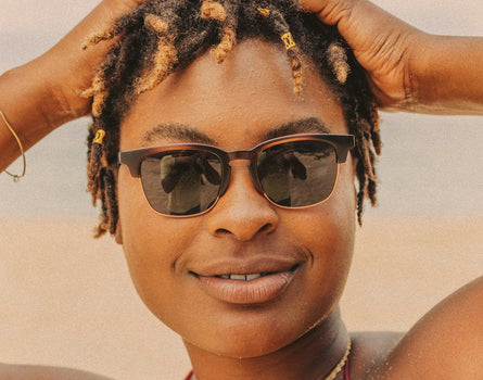 woman wearing sunski cambria whiskey tort slate sunglasses