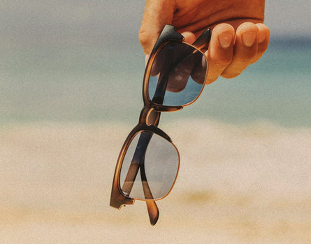 hand holding sunski cambria sunglasses