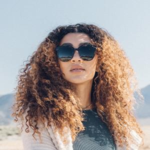 woman wearing sunski camina sunglasses