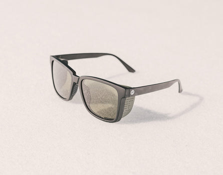 sunski couloir sunglasses in the snow