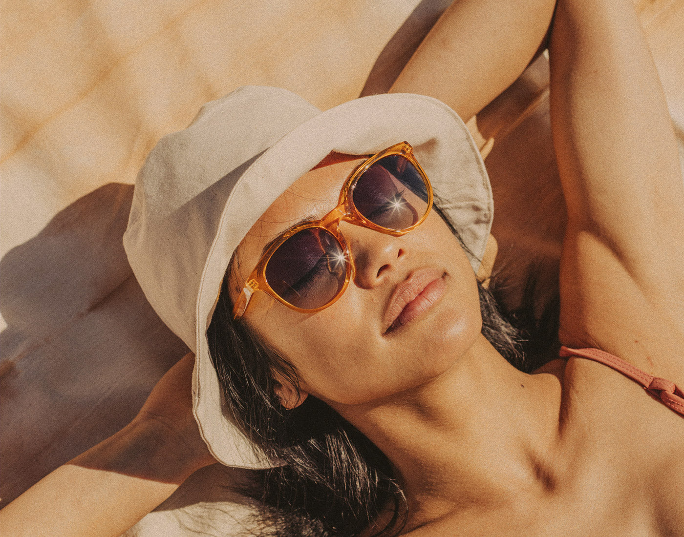 woman basking wearing sunski makani sunglasses