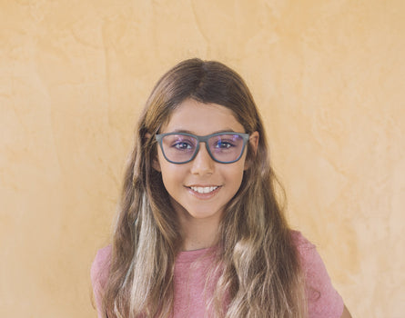 girl wearing sunski mini headland bluelight glasses