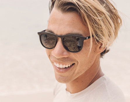guy laughing wearing sunski seacliff sunglasses