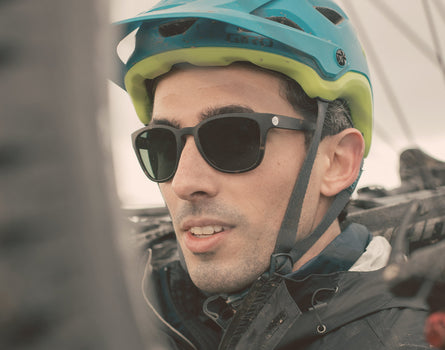 guy in a bike helmet wearing sunski topeka sunglasses