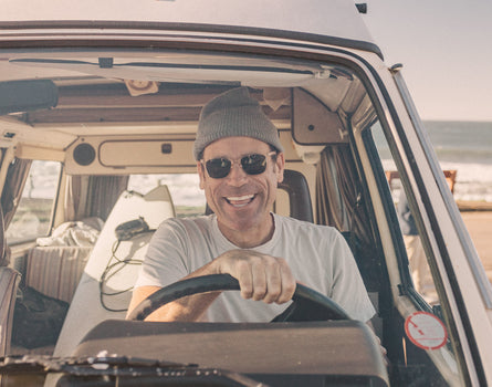 guy driving a car wearing sunski ventana sunglasses