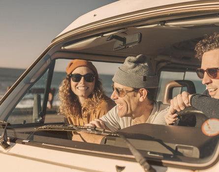 three people laughing wearing sunski ventana sunglasses
