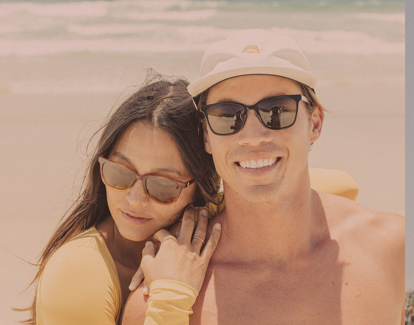 guy and girl wearing sunski ventana sunglasses