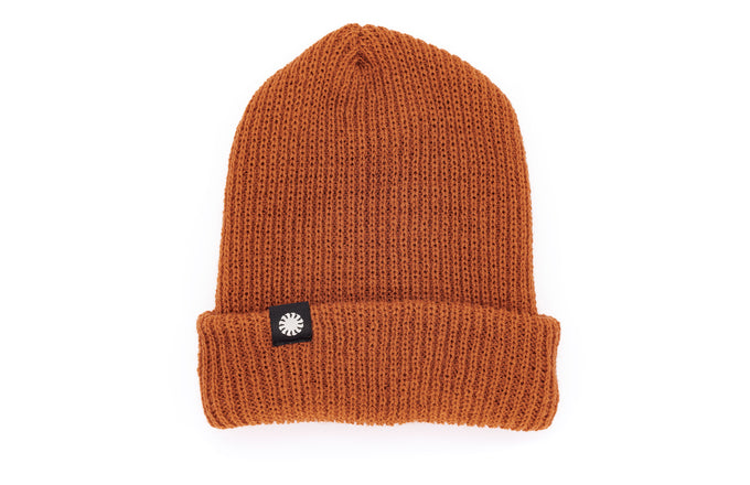 sunski shoulder season beanie burnt sienna flat lay