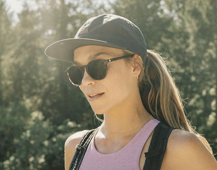 profile angle of girl wearing sunski sunburst hat