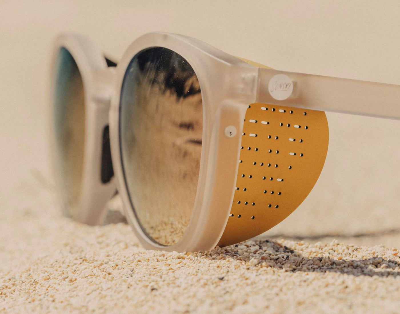 sunski tera sun shields on a pair of sunski tera stone alpenglow sunglasses