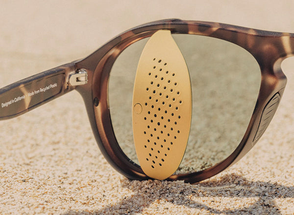 RICH sunski treeline sun shield folded in to see inset magnet