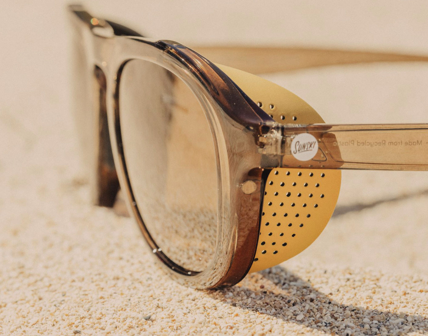 close up three quarter angle of sunski treeline sunglasses with sunski treeline sun shields