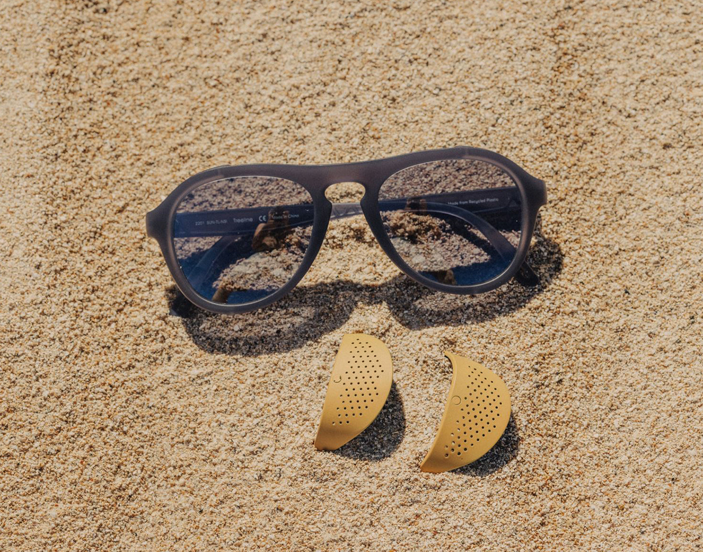 sunskit treeline sunglasses and sunski treeline sun shields in the sand