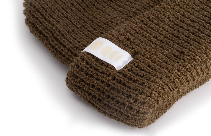 sunski winter sun beanie forest close up of tag