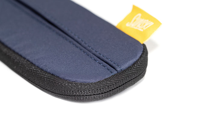 sunski zipper case navy close up with logo tag